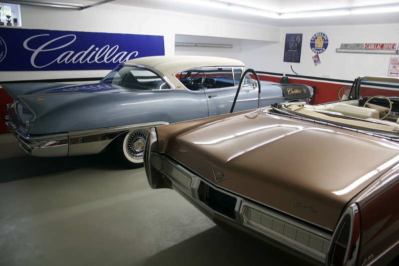 Cadillacs in garage