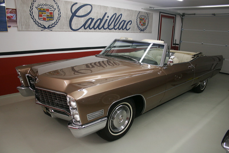 Cadillacs in garage